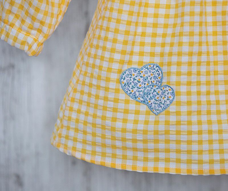 AMANTALA-VOLANTES-LIMÓN-DETALLE-CORAZONES-ESPALDA