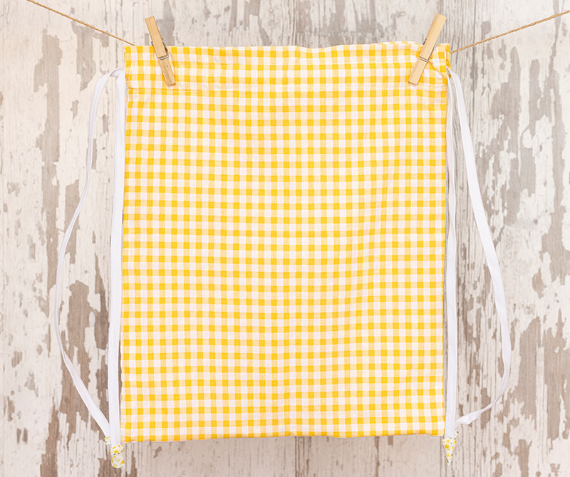 BOLSA-MUDA-VOLANTES-LIMÓN-ESPALDA-BAJA