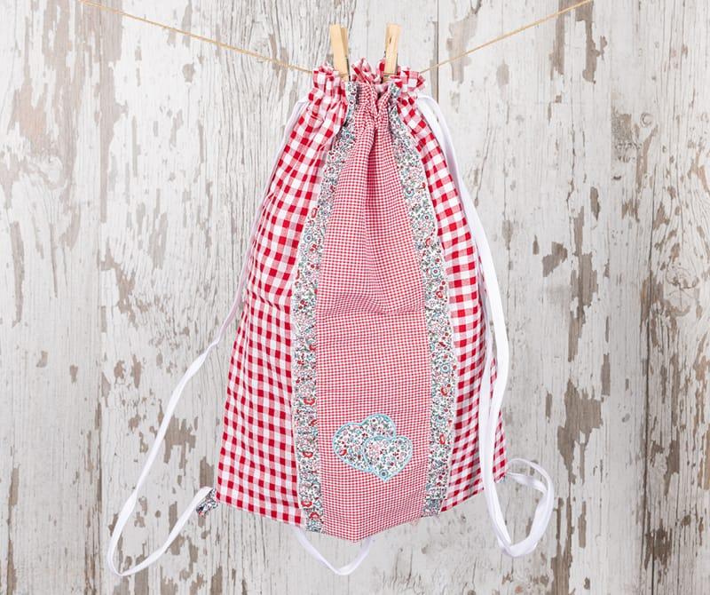 Bolsa Muda Volantes Carmín Turquesa